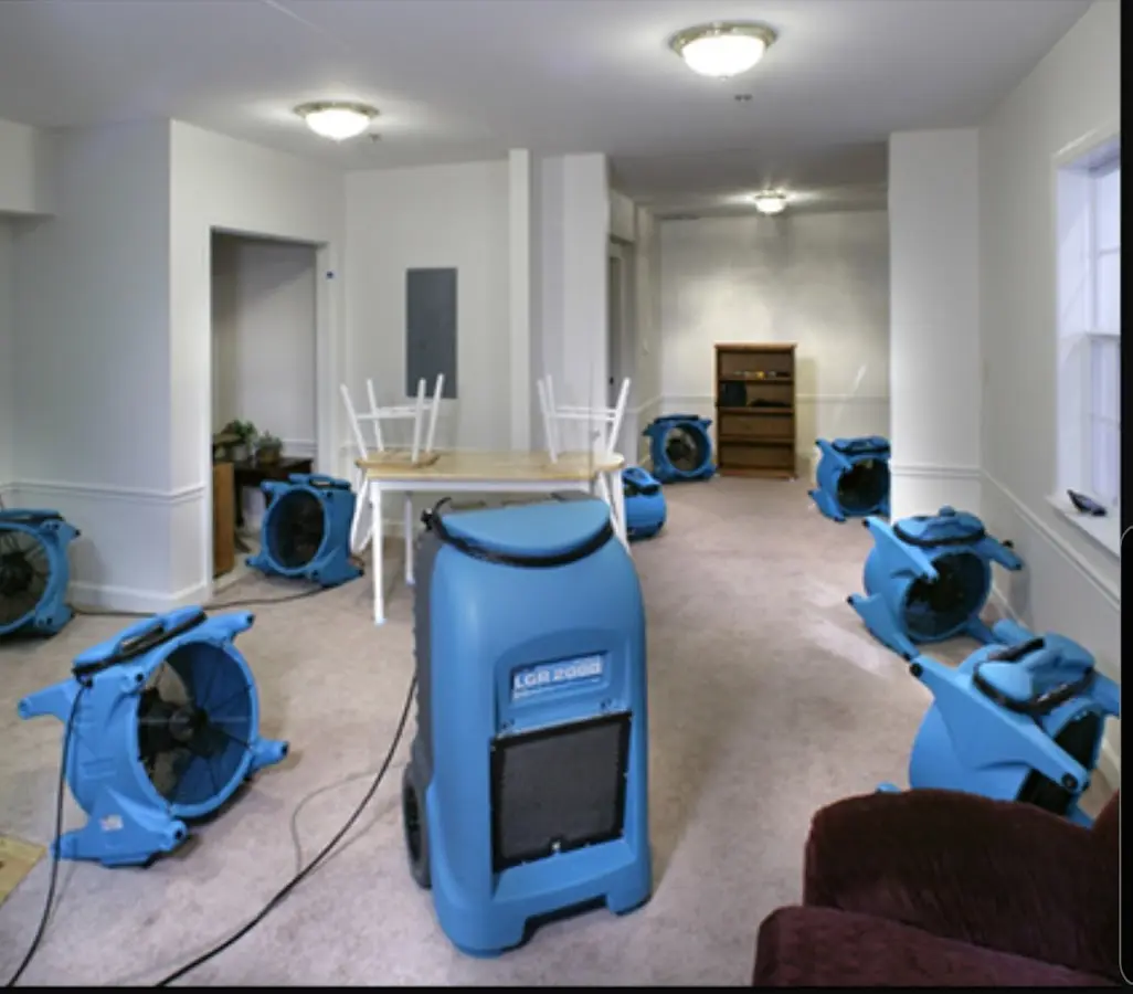 Air movers and dehumidifier setup for Water Damage Restoration in Crowley